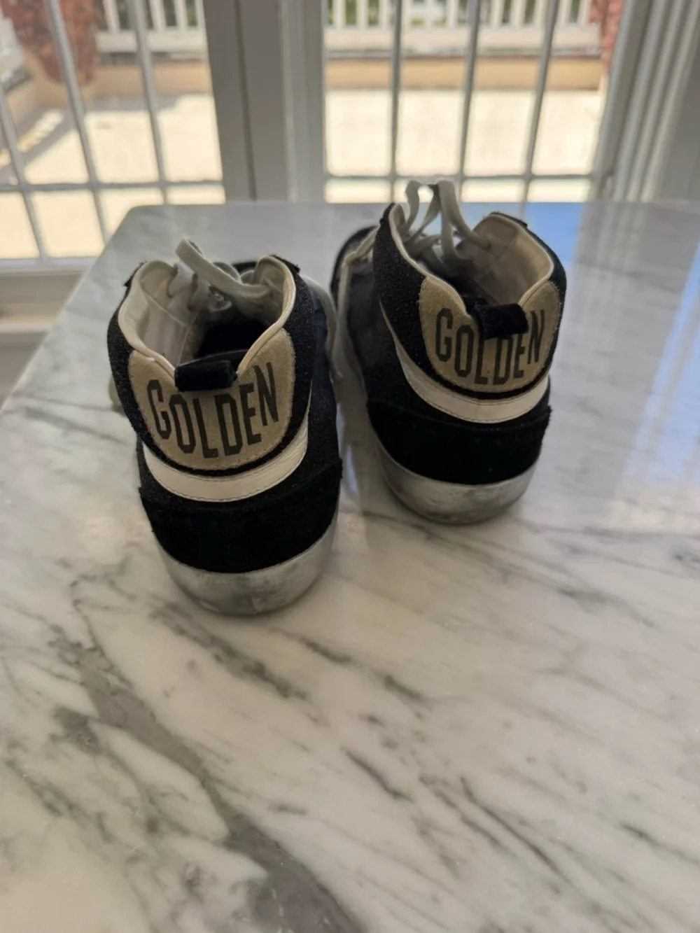 Golden Goose Black and White Midstar High-Top Sneakers - Picture 2 of 4